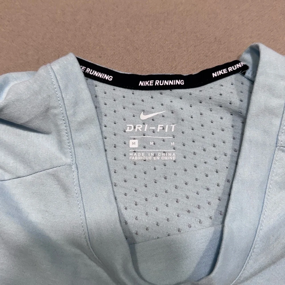 Nike Women's Light Blue Dri-Fit Short Sleeve Tee